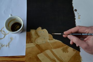 Painting with coffee of a little character in bed.